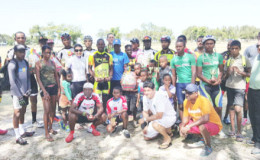 The top performers of yesterday’s 23nd annual Ricks and Sari Agro Industries multi-race cycle programme pose with their rewards at the National Park. (Orlando Charles photo)
