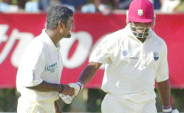 FLASHBACK: Brian Lara (right) and Murali during one of their many career battles. 