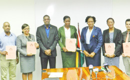 Ministers of Public Infrastructure, David Patterson (third from left) and Annette Ferguson (fifth from left) with the board members of Guyana Power and Light Inc. (Ministry of Public Infrastructure photo)
