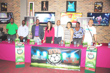 GFF President Wayne Forde (third from left) and ANSA McAL PRO Darshanie Yussuf (fourth from left) along with others during yesterday’s launching.  
