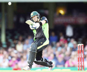 Shane Watson smashes a boundary during his century knock yesterday. 