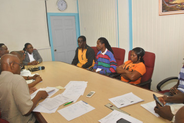 Noel Sanbach, Glendon Critchlow and Natasha Daniels tell their tale of woe to Minister Broomes on Tuesday.