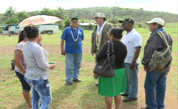 Ministers of Foreign Affairs, Carl Greenidge and Indigenous Peoples’ Affairs, Sydney Allicock interacting with residents of Kaikan (GINA photo)