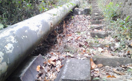The landslide moved this steel pipe some distance away from the concrete structure where it once rested. This SN file photo was taken in 2013.