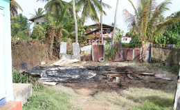The remains of the house after the fire at Ann’s Grove yesterday