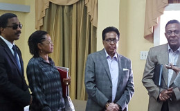 Attorney General Basil Williams left with members of the Walter Rodney Commission of Inquiry yesterday (Ministry of Legal Affairs photo)