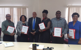 Minister of Natural Resources Raphael Trotman (third from left) with members of the Closed Areas Committee (Ministry of the Presidency photo)