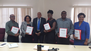 Minister of Natural Resources Raphael Trotman (third from left) with members of the Closed Areas Committee (Ministry of the Presidency photo)