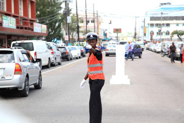 A City Constabulary Officer directs traffic at Regent and King streets. (Photo by Keno George) 