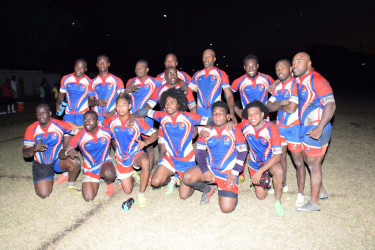 The triumphant Pepsi Hornets pose for a photo in their new outfits following their 38-20 victory last Saturday versus the Yamaha Caribs.
