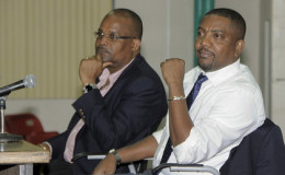 WICB president Dave Cameron (right) and vice president Emmanuel Nanthan.
