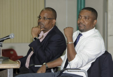 WICB president Dave Cameron (right) and vice president Emmanuel Nanthan. 