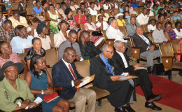 President David Granger (sitting at right) shares a light moment with former Chairman of the Guyana Congregational Union, Pastor Oslen Small.  (Ministry of the Presidency photo)
