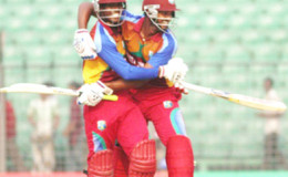 Keemo Paul (left) celebrates with Jyd Goolie after West Indies Under-19s beat Pakistan Under-19s in the quarter-final of the Under-19 Cricket World Cup here yesterday. (Cananews)