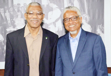 President David Granger (left), yesterday, met with Chancellor of the University of Guyana, Professor Nigel Harris to discuss matters related to the repositioning of the institution such as effective governance, finance and the maintenance of infrastructure, enhancing research capabilities and students’ experience. (Ministry of the Presidency photo) 