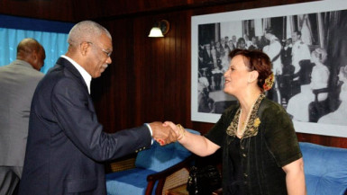 President David Granger greets Member of Parliament of the Canadian House of Commons, Alexandra Mendѐs, at the Ministry of the Presidency.  (Ministry of the Presidency photo)