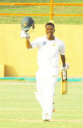 Leon Johnson acknowledges the cheers following his third first class ton. 