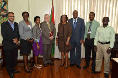 From left: PS of the Ministry of the Presidency Omar Shariff; PS, Ministry of Education Delma Nedd; Development Officer, High Commission of Canada Marcella Thompson; Canadian High Commissioner to Guyana Pierre Giroux; Regional Project Manager, Caribbean Leadership Project Lois Parkes; Minister of State Joseph Harmon; PS, Department of Public Service Reginald Brotherson and PS, Ministry of Communities Emil McGarrell following yesterday’s meeting. 