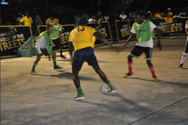 Part of the action on the final night of group matches in the 2nd Annual Guinness of the Streets West Demerara Championship at the Vergenoegen Rice Mill Tarmac. 