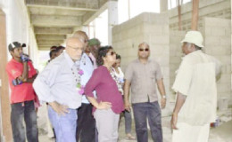 Then President Donald Ramotar (left), then Education Minister Priya Manickchand (second from left) and others inspecting the Kato building in November of 2014. (GINA photo)
