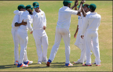 The Guyana players celebrate the dismissal of Roston chase.
