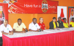 Members of the Golden Jaguars and Suriname International match launch party from left to right-Suriname Captain Albert Nibte, Suriname Head-coach Werner Blackson, Team Manager Humphrey Dundas, Banks Beer Brand Manager Brian Cho-Hen, GFF PRO Debra Francis, Guyana Head-coach Jamaal Shabazz, Golden Jaguars Captain Gregory Richardson and Golden Jaguars’ Colin Nelson pose for a photo opportunity following the official launch yesterday at the Pegasus Hotel. (Orlando Charles photo)