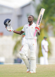 Jonathan Carter is eleated after reaching his century against the Guyana Jaguars yesterday. (Photo by WICB Media/Randy Brooks of Brooks Latouche Photography 