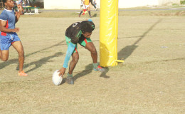 Captain Lance Adonis records a try for the UG Wolves in their 99-nil drubbing of the Police Falcons Saturday when the GRFU/GTT 15s league continued at the National Park.
