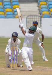 Guyana skipper Leon Johnson hits a six on the fourth and final day of the seventh round match between Barbados Pride and Guyana Jaguars in the WICB Professional Cricket League Regional 4-Day Tournament on Monday, at Kensington Oval. Photo by WICB Media/Randy Brooks of Brooks Latouche Photography 