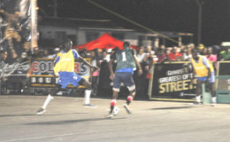 Marvin Josiah (no.1) of Showstoppers on the attack against Shattaville Gunners during the grand finale of the 2nd annual Guinness of the Streets West Demerara championship at the Pouderoyen Tarmac.
