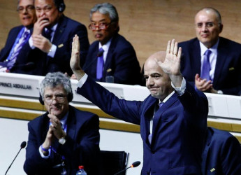 Newly elected FIFA President Gianni Infantino gestures next to UEFA Vice-President Angel Maria Villar Llona (L) during the Extraordinary Congress in Zurich, Switzerland yesterday.REUTERS/Ruben Sprich 