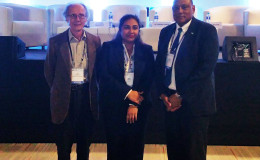 Guyana’s delegation in Peru: Minister of Natural Resources Raphael Trotman (right) with Mike McCormack and Joy Persaud of the Guyana Policy Forum