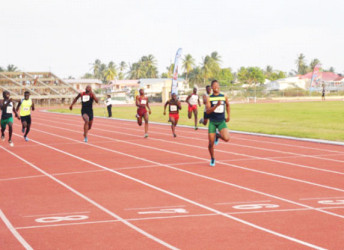 Compton Caesar scorches the field to win the under-20 boys 200m final in 21.51s yesterday.  