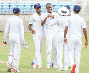 Fast bowler Miguel Cummins (second from left) celebrates another wicket during Barbados Pride’s  victory yesterday. (Photo courtesy WICB Media)  