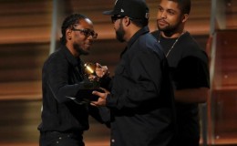 Kendrick Lamar (L) takes the stage to accept the award for Best Rap Album for "To Pimp A Butterfly" from presenters Ice Cube and O'Shea Jackson Jr. at the 58th Grammy Awards in Los Angeles, California February 15, 2016. REUTERS/Mario Anzuoni