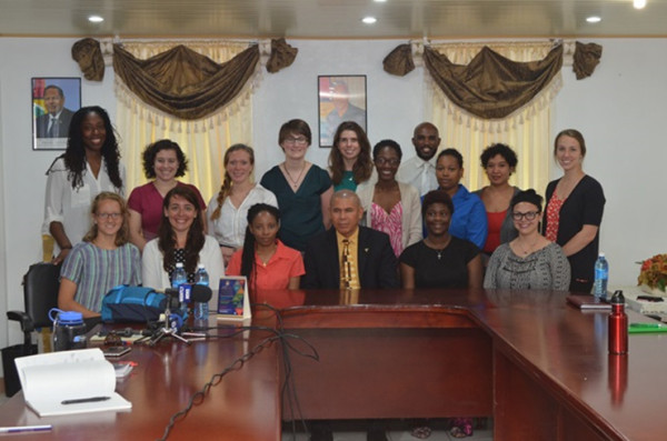 The Peace Corps Volunteers with Public Health Minister, Dr. George Norton  (GINA photo)