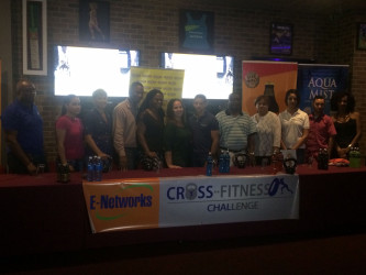 The principals of the second annual E-Networks CrossFit Games pose for a photo following the launch last night at the 704 Sports Bar. 