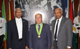 Brazil’s Minister of External Affairs, Mauro Luiz Iecker Vieira (centre) flanked by President David Granger (left) and Chancellor of the Judiciary, Justice Carl Singh.   (Ministry of the Presidency photo)