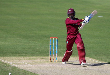 West Indies wicketkeeper batsman Denesh Ramdin scores through the off-side during his unbeaten 52 against Warwickshire on Friday. (Photo courtesy WICB Media)  