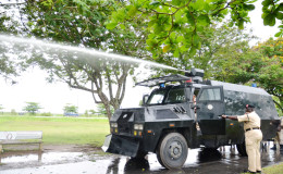The water cannon spews water during a test in the National Park in June 2012. (Stabroek News file photo)