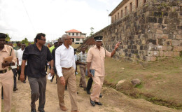 President David Granger (third from left) and Minister of Public Security,  Khemraj Ramjattan (second from left) being led on a tour of the Mazaruni Penal Settlement by Officer in Charge, Alexander Hopkinson yesterday. The visit was part of an assessment of the options for the prison system in the wake of Thursday’s deadly riot at the Camp Street jail. (See story on page three) (Ministry of the Presidency photo)
