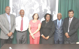 Minister of Public Security Khemraj Ramjattan (right) and Minister of State Joseph Harmon (left) flank from second right: Chairman of the Prison CoI Justice James Patterson, Chief Magistrate Ann McLennan, human rights activist Merle Mendonca and former prisons director Dale Erskine after yesterday’s swearing in. (Photo by Keno George)