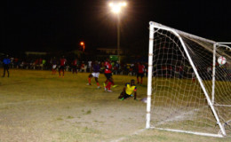 Fruta Conquerors Shaquille Agard (third from right) in the process of netting the opening goal against Monedderlust FC in their League Finale matchup of the GFF Stag Beer Elite League at the Tucville Community ground.
