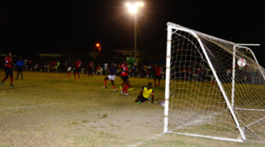 Fruta Conquerors Shaquille Agard (third from right) in the process of netting the opening goal against Monedderlust FC in their League Finale matchup of the GFF Stag Beer Elite League at the Tucville Community ground. 