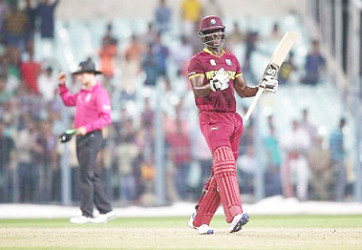 Captain Darren Sammy celebrates West Indies’ win over Australia in their second official warm-up of the Twenty20 World Cup.  