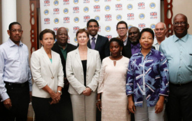 Guyana’s Finance Minister Winston Jordan (right) and other country representatives who attended the CDB meeting (CDB photo) 