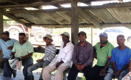 Some of the private cane farmers waiting on their cane to be discharged at the Wales estate last week
