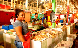 Fish vendor Nikki Theablu and her staff trading on Sunday

