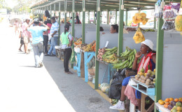 Vendors plying their trade from their new stalls at Merriman Mall, which they have complained are small and overpriced. (See story on centre pages) (Photo by Keno George) 