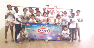 The various category winners display their prizes following the conclusion of the Kraft Toucan Industries Junior Skill Level tournament Sunday at the Georgetown Club. (Photo courtesy of the Guyana Squash Association) 